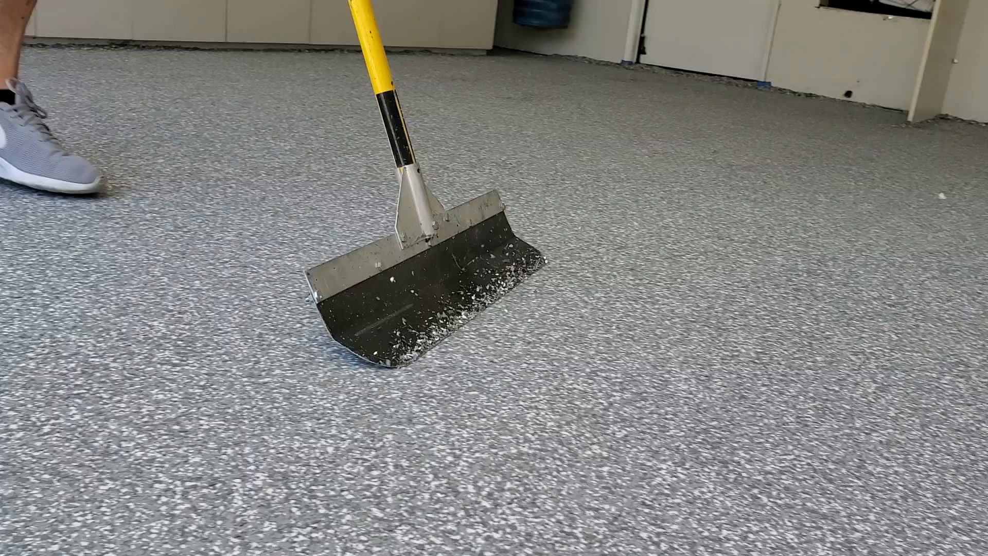 Scraping the cured flake floor
