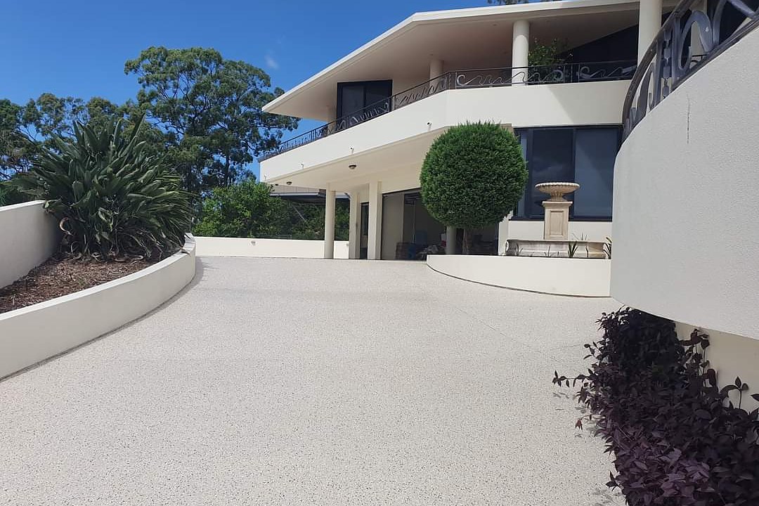 Driveway and walkway concrete coating at a home