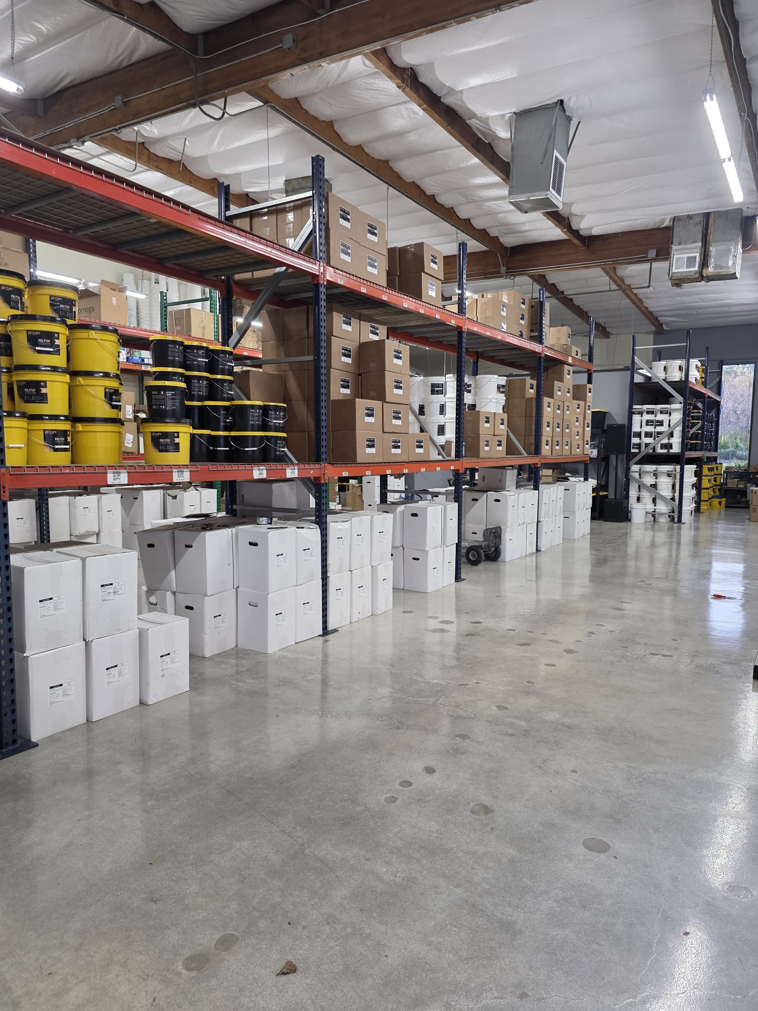 Top Epoxy Flooring warehouse stocked with our own coating materials